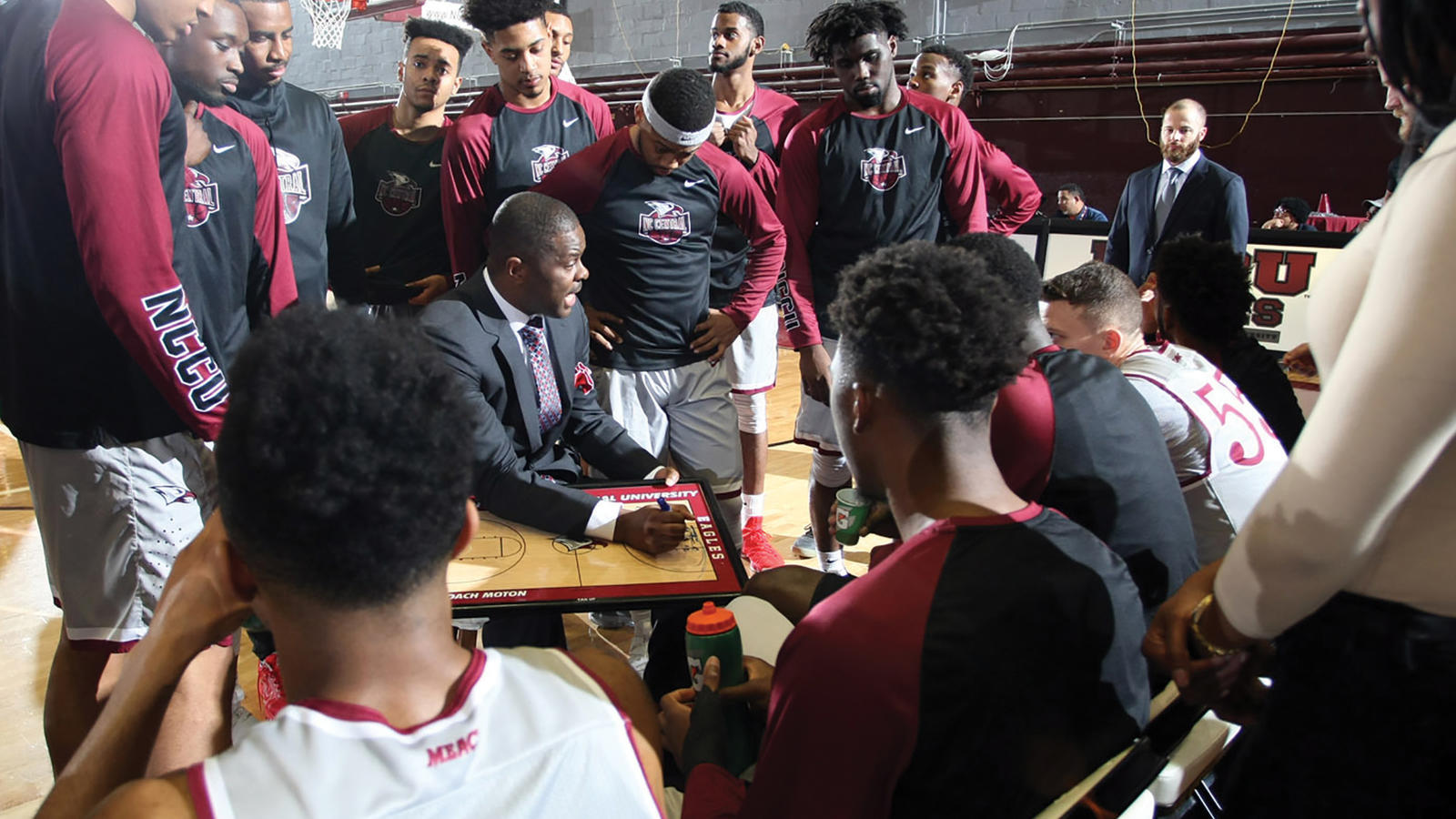 Coach Moton and the Eagles Basketball Team