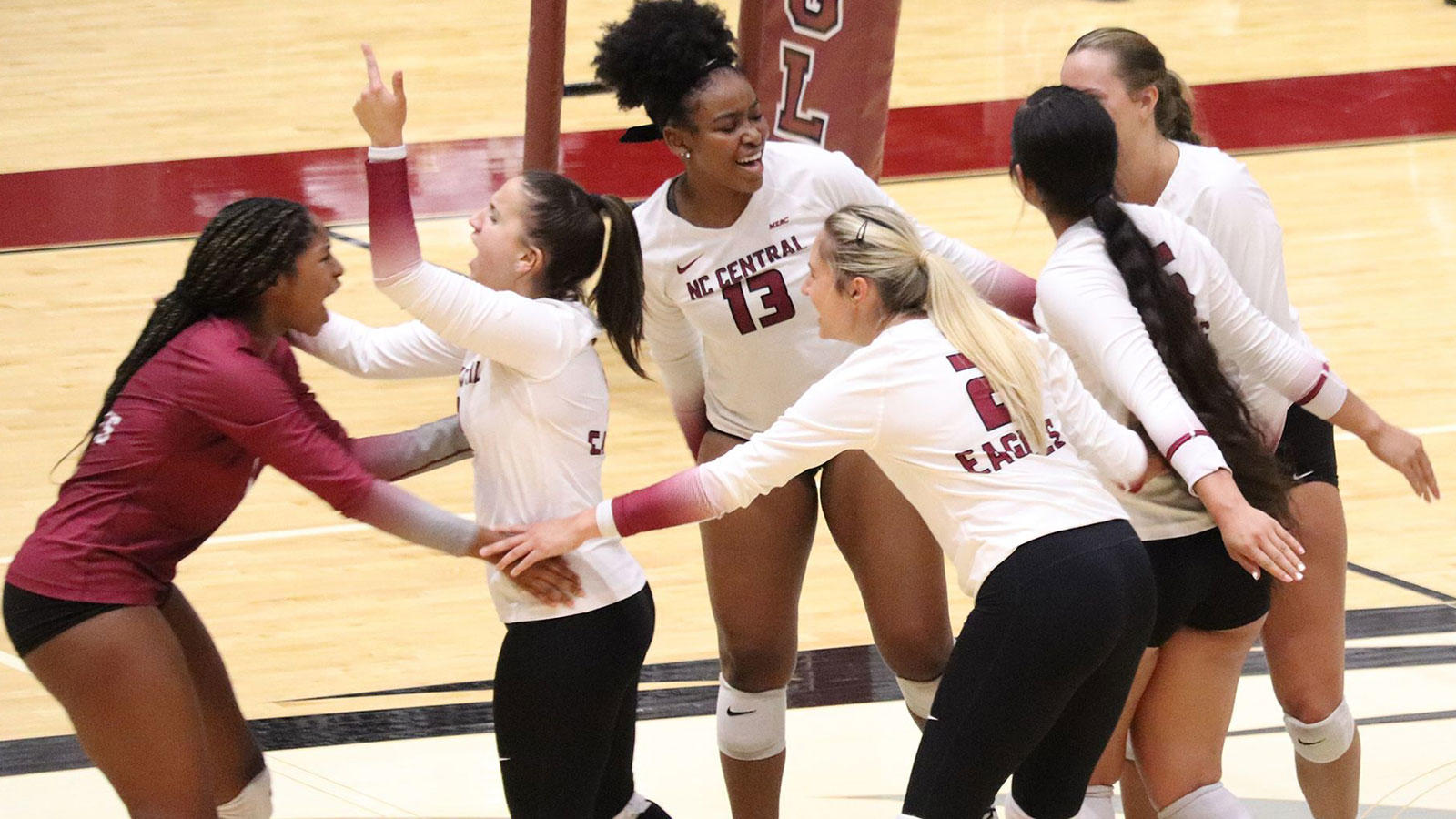 NCCU volleyball players celebrating