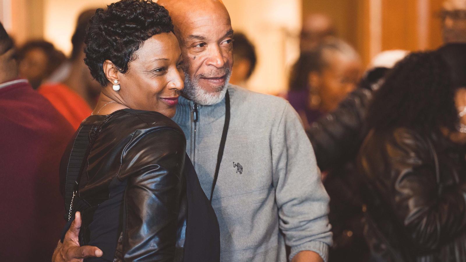 An NCCU alumni couple posing for a photo