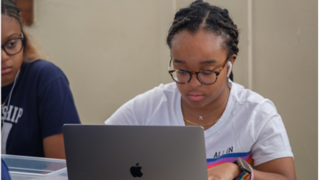 Student on the laptop.