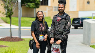 Two NCCU students posing
