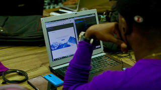 Student working on a laptop