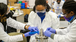 Students in a science class doing an experiment