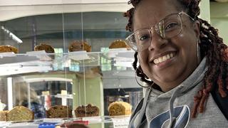 Khalia Spivey in front of her award winning baked goods