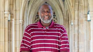 Teddy Spivey in maroon shirt