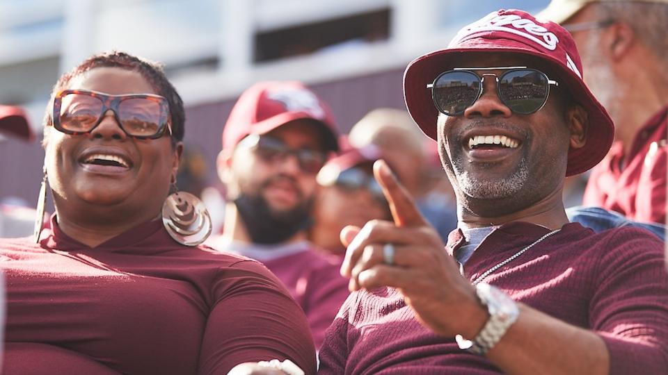 A NCCU Alumni couple at a football game