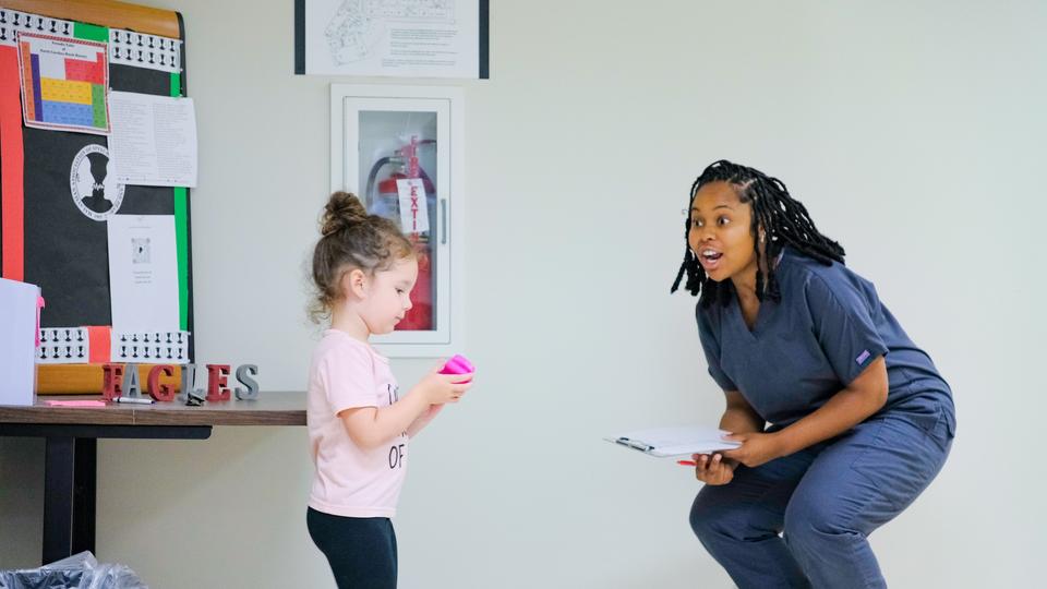 Speech, Language & Hearing Clinic. Student clinician and child client.