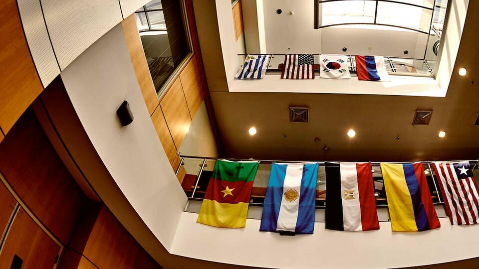 Inside Mary Townes building with flags