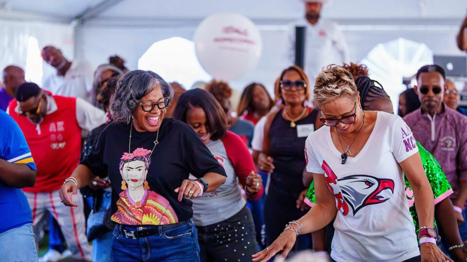 D9 Tailgate crowd shot 2024 - women and men dancing