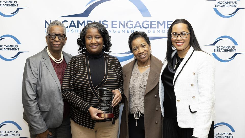 RN Harris and NCCU Community Engagement and Service Accepting Award