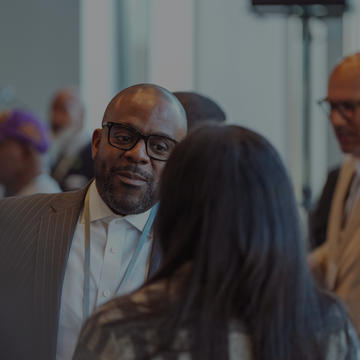 A group of people meeting with the new NCCU chancellor